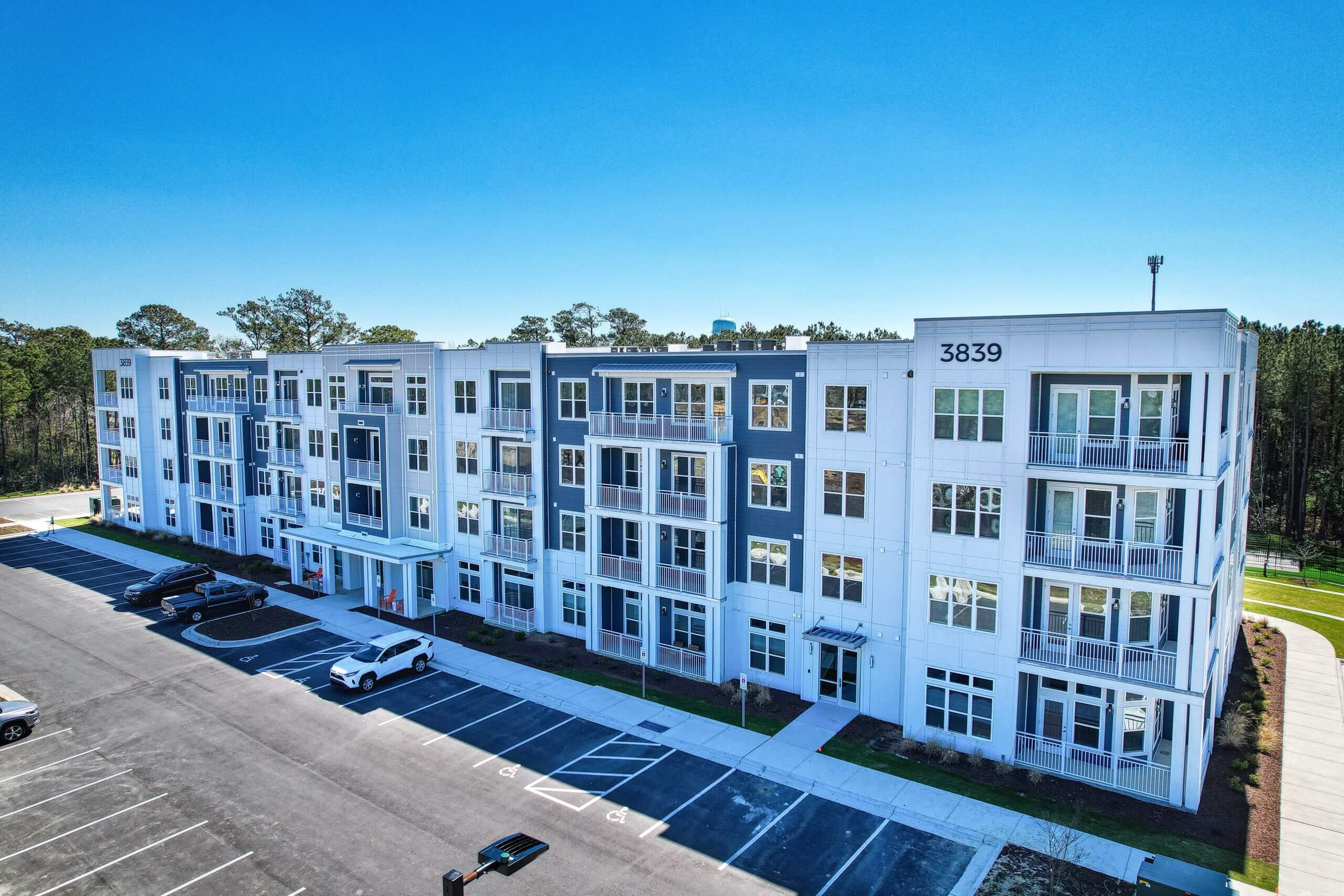 The Retreat at Carteret Modern Apartments Exterior View Parking Lot